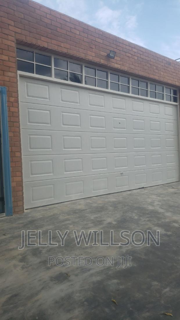 Garage Door Fixter Fanlight 18 X 8 · Photo 1