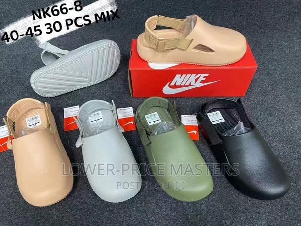 Nike Calm Mule Slippers · Photo 1