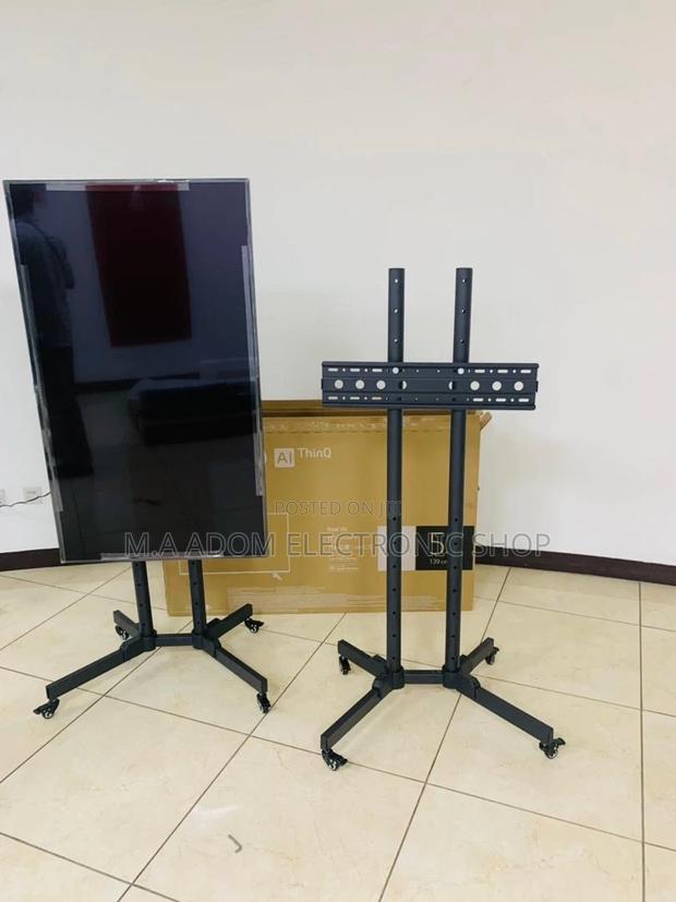 Authentic Moveable Tv Trolly for 32” to 70 Inch(Black). · Photo 1
