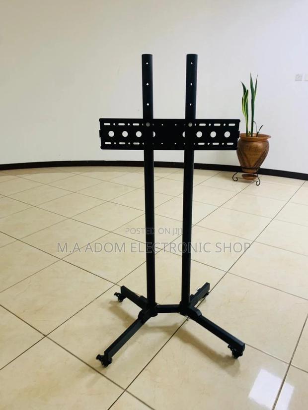 Well Design Moveable Tv Trolly for 32” to 70”(Black). · Photo 1