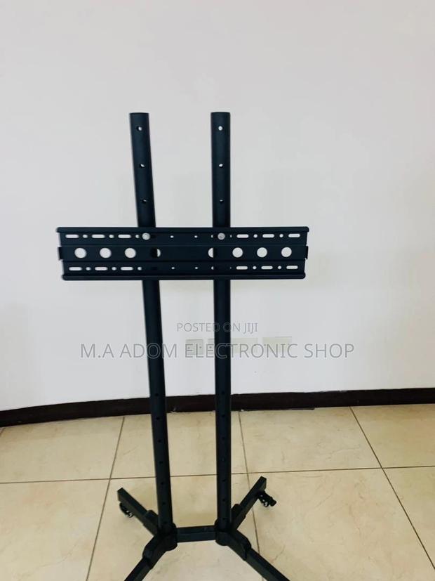 Anti-Rust Moveable Tv Trolly for 32” to 70 Inch(Black). · Photo 1