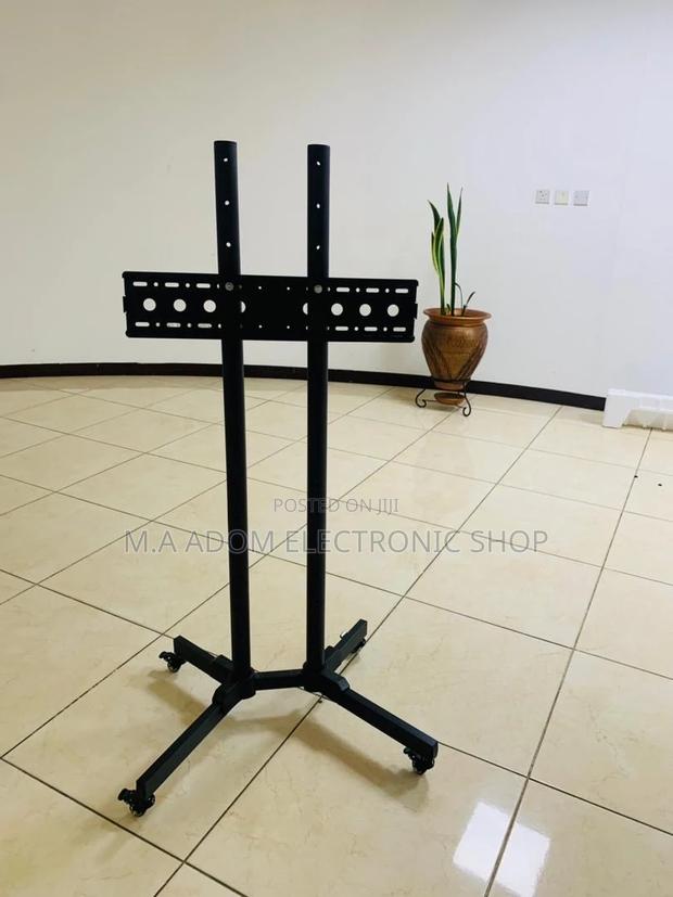 Stainless Steel Moveable Tv Trolly for 32” to 70”(Black). · Photo 1
