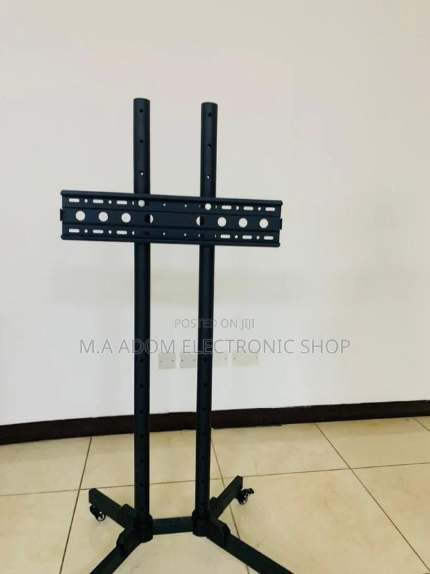 Long Lasting Moveable Tv Trolly for 32” to 70”(Black). · Photo 1