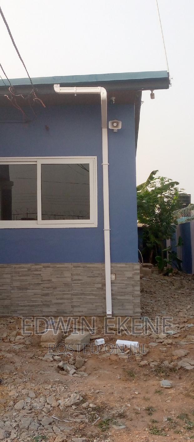 Installation of PVC Rain Gutters · Photo 1