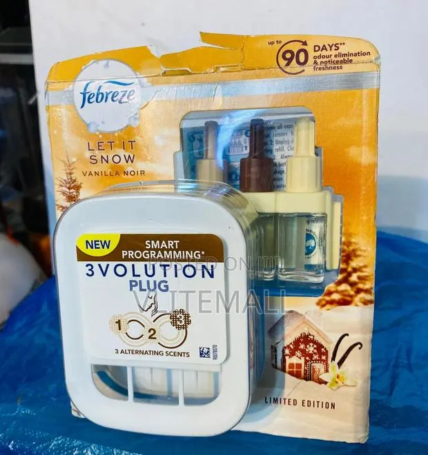 Smart Programming 3 Volution /Febreze Plugin Air Freshener · Photo 1