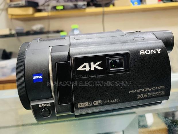 Newly In Stock Sony FDR-AXP35 Camcorder(4k Ultra HD). · Photo 1