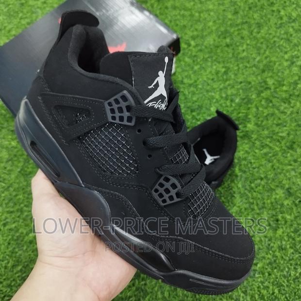 Original Nike Jordan 4 Triple Black · Photo 2