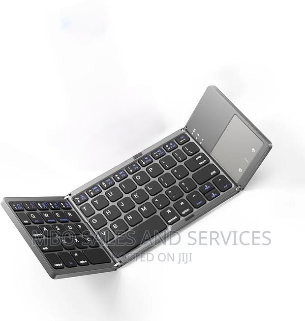 Foldable Portable Wireless Keyboard With Touchpad · Photo 1