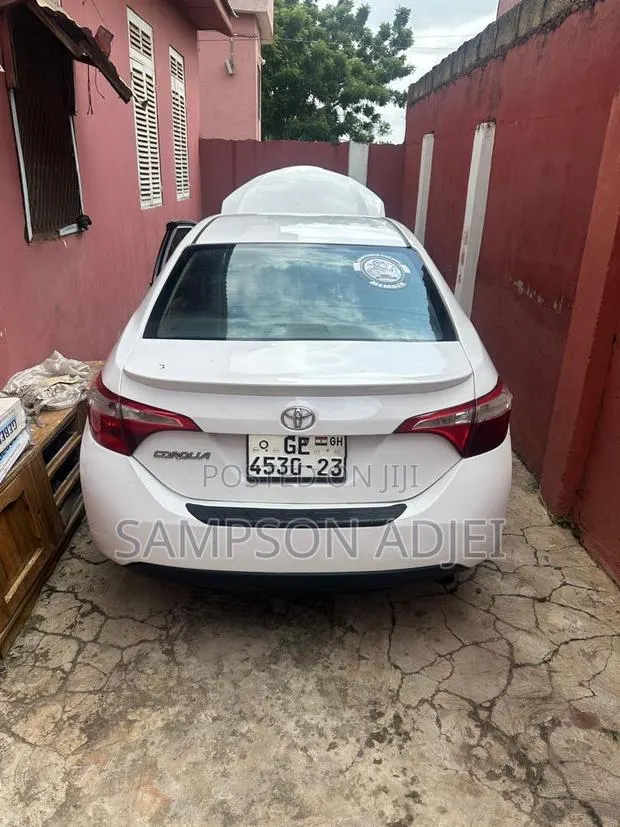 Toyota Corolla 2014 White · Photo 1