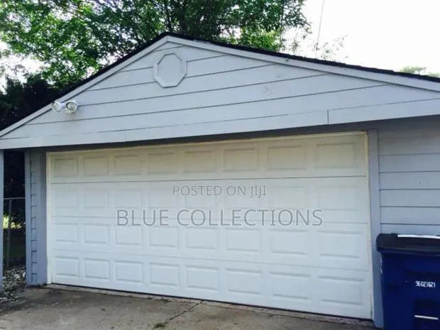 14×8 Automated Garage Door · Photo 1