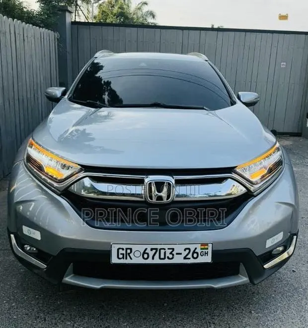 Honda CR-V Touring 4dr SUV AWD (1.5L 4cyl CVT) 2017 Silver · Photo 1