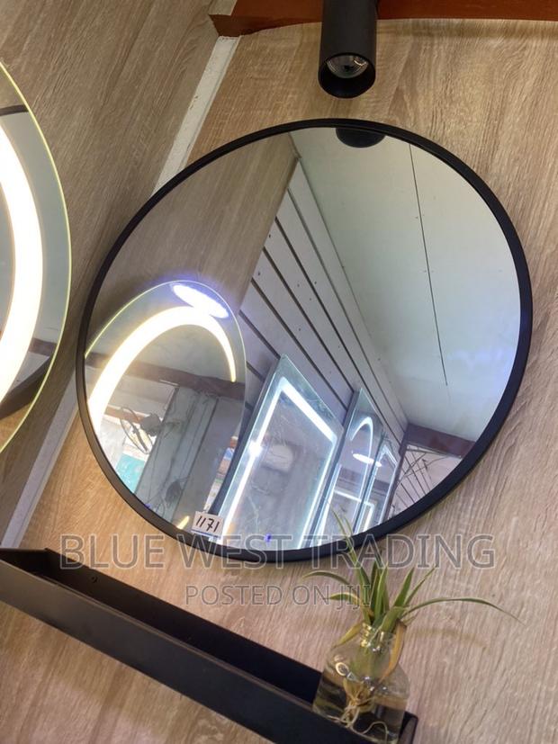 Decorative Round Miror With Black Shelves (60 CENTIMETERS) · Photo 3