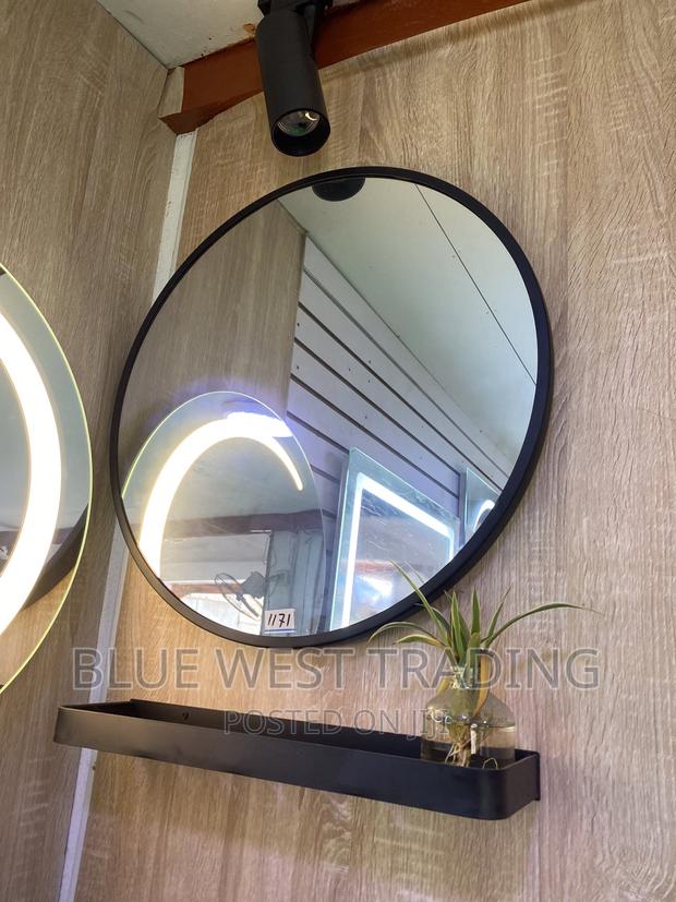 Decorative Round Miror With Black Shelves (60 CENTIMETERS) · Photo 2