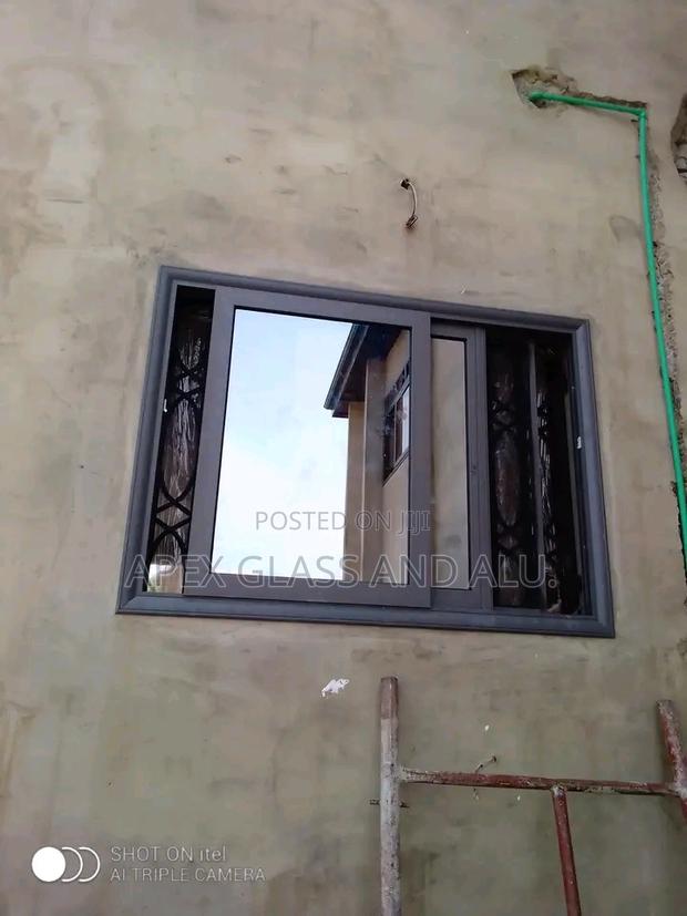 Aluminum Sliding Window With an Arc · Photo 1