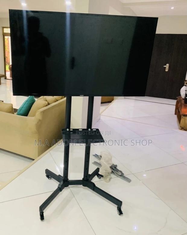 Newly in Stock Moveable Tv Trolly for 32”-70” Tv,Black. · Photo 1