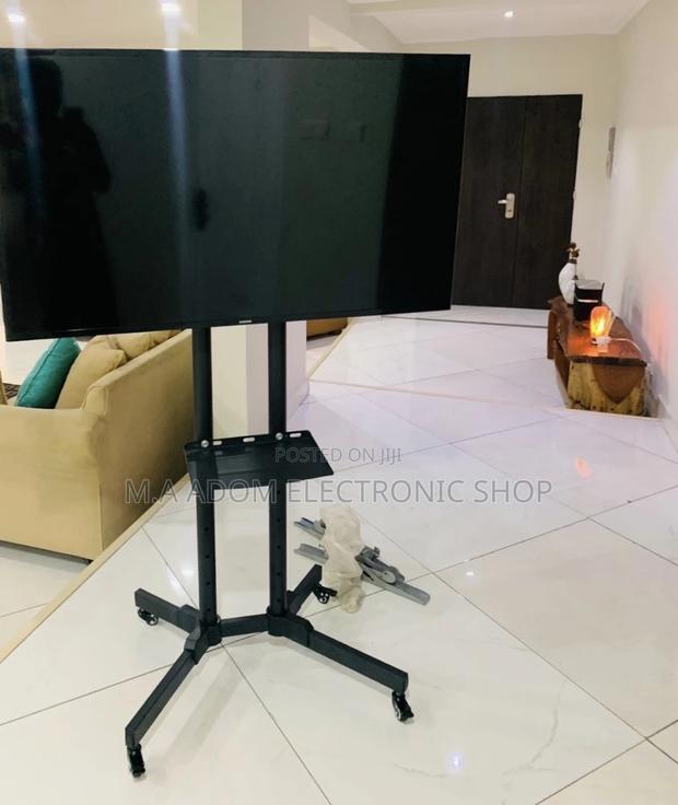 Fresh in Box Moveable Tv Trolly for 32”-70” Tv,Black. · Photo 1