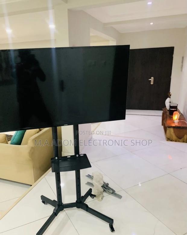 Classic Design Moveable Tv Trolly for 32”-70” Tv,Black. · Photo 1