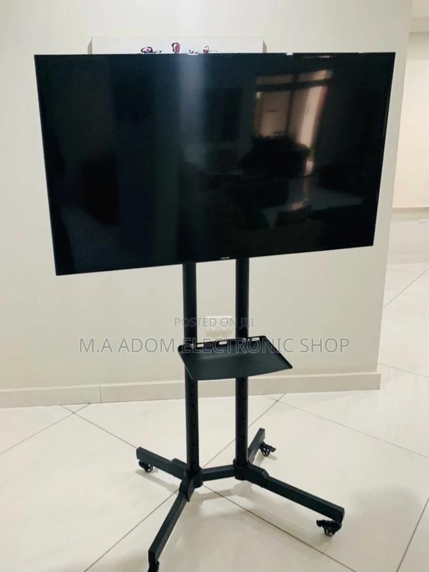 Anti-Rust Moveable Tv Trolly for 32” to 70 Inch Tv,Black. · Photo 1