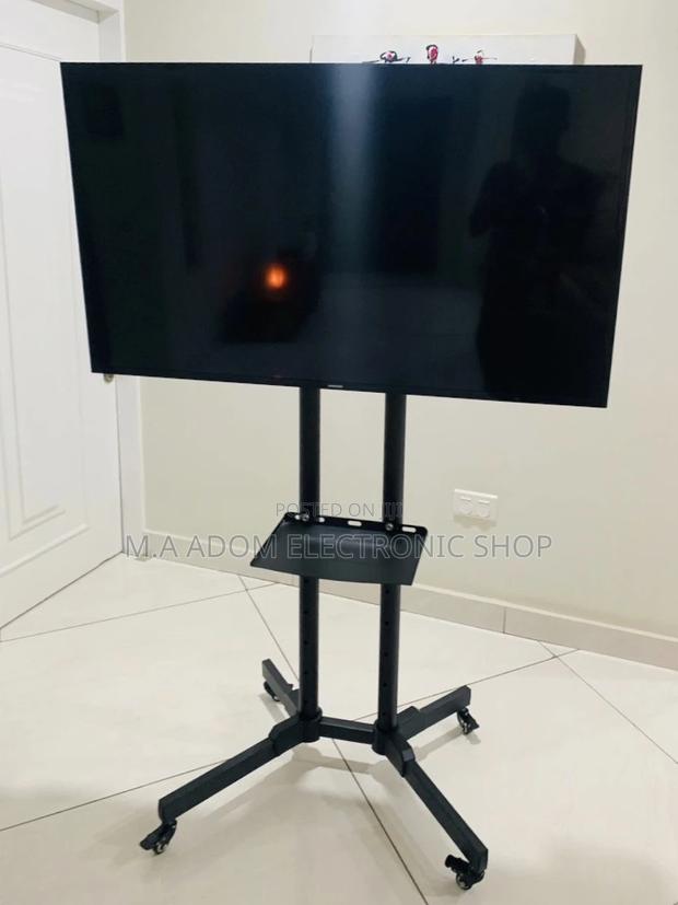 Affordable Moveable(Black)Tv Trolly for 32-70 Inch Tv. · Photo 1