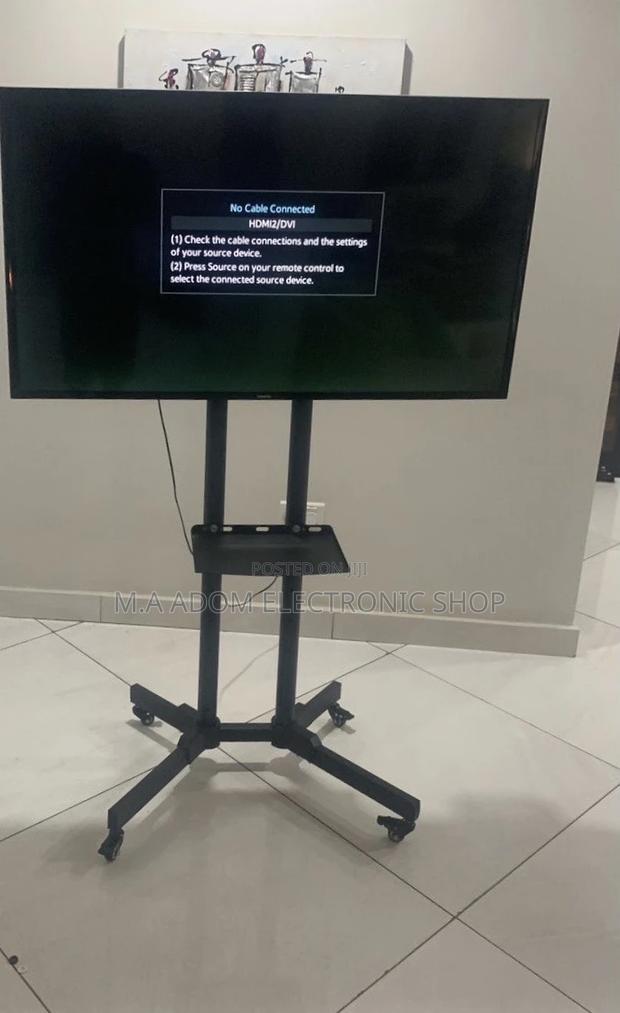 Moveable Tv Trolly for 32 Inch to 70 Inch Tv(Black). · Photo 1