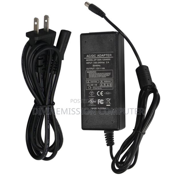 12v 4A Adapter for Laptops,Keyboards,Tv,And So On · Photo 1