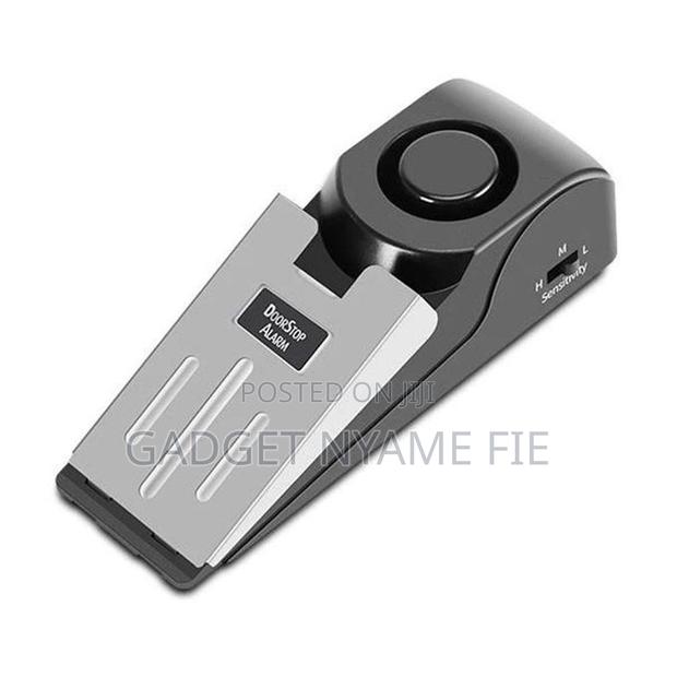 Portable Wireless Alarm Door Stopper · Photo 1