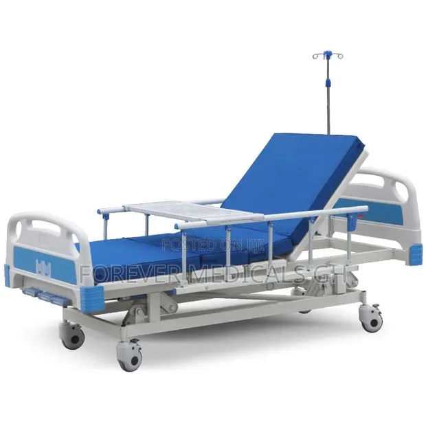 Hospital Bed 3 Crank With Mattress, Drip Stand and Overhead Table · Photo 1
