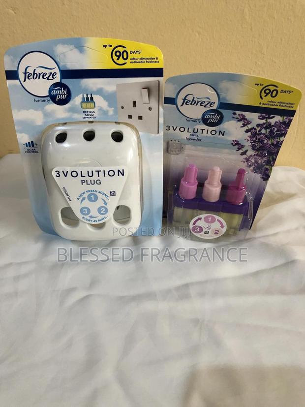 Febreze Three Volution Plugin Air Freshener · Photo 2