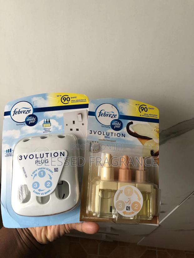 Febreze Three Volution Plugin Air Freshener · Photo 3