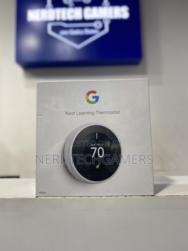 Goggle Nest Learning Thermostat · Photo 1