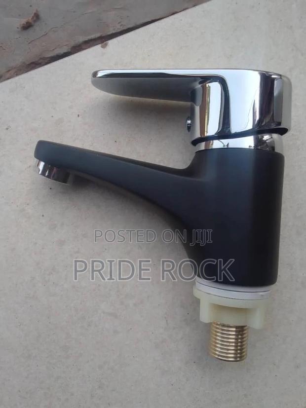 Black and Chrome Single Lifted Black and Chrome Basin Tap · Photo 2