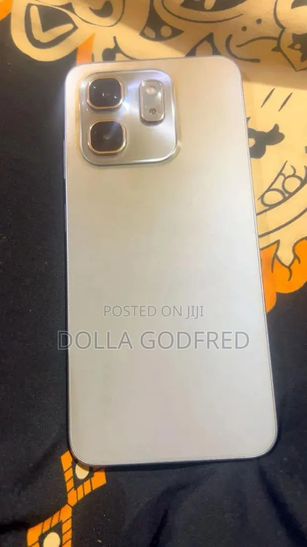 Infinix Hot 50i 128 GB Silver · Photo 1