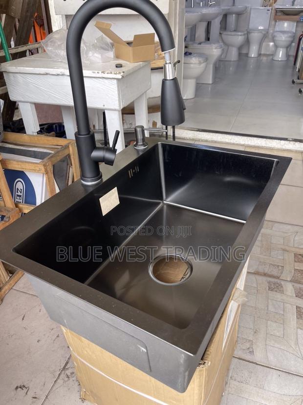 Black Cabinet Sink With Pull Out Tap · Photo 2