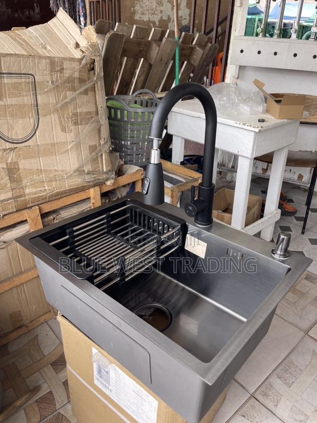 Black Cabinet Sink With Pull Out Tap · Photo 1