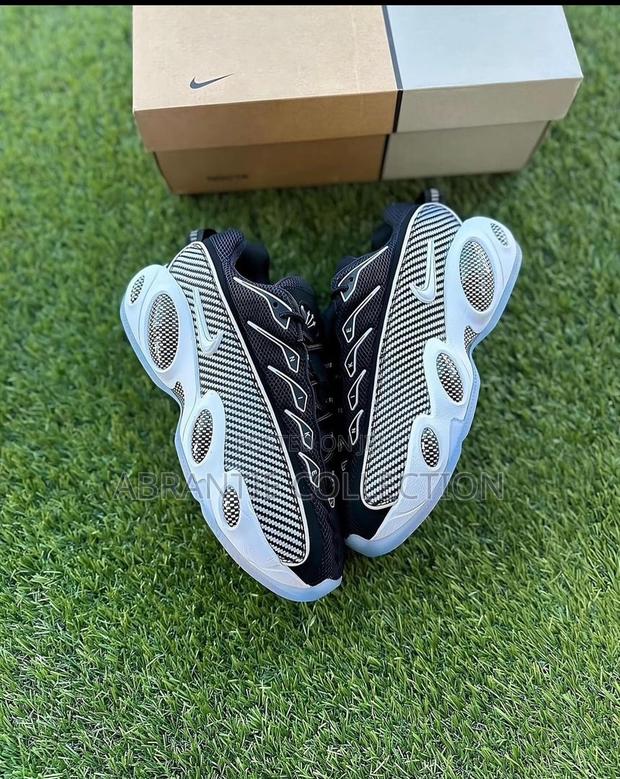 Nike Nocta Crimson Glide · Photo 1