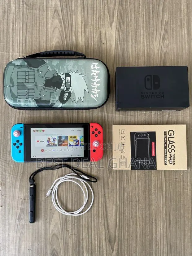 Nintendo Switch With 5 Games and Accessories · Photo 1