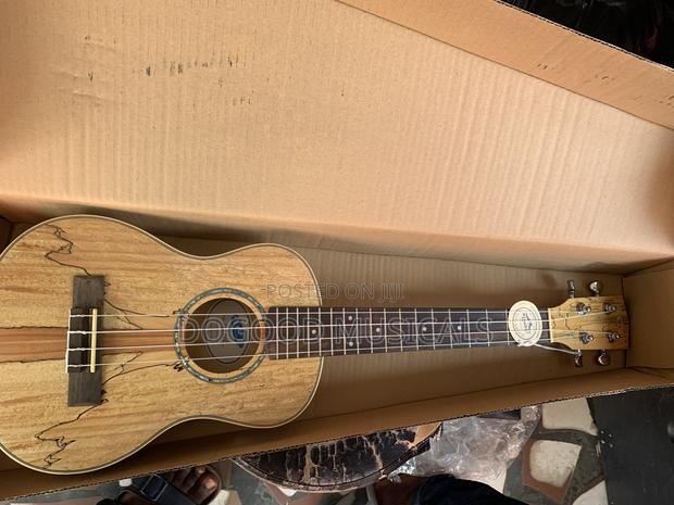 Acl Ukulele Guitar · Photo 2