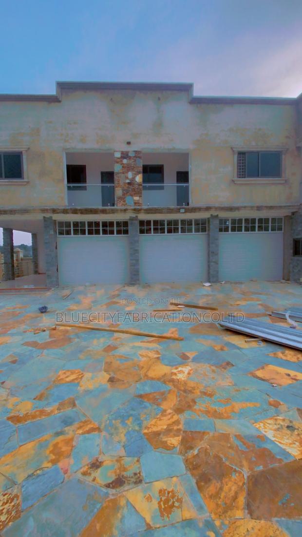 American Triple Automatic Garage Doors · Photo 2