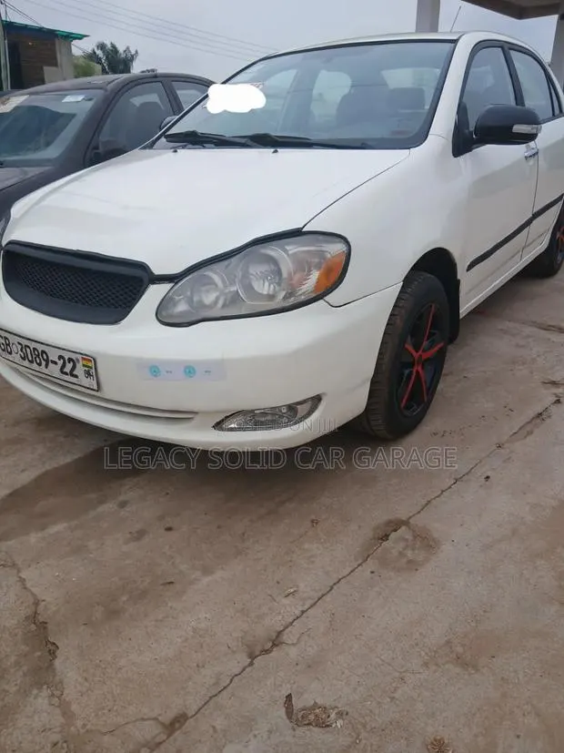 Toyota Corolla 2009 White · Photo 1