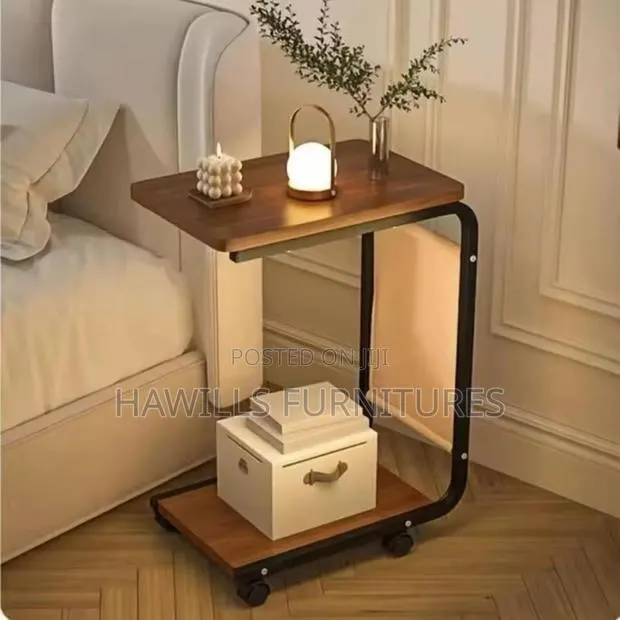 Sofa Side Table Featuring a Dark Wood Finish. · Photo 1