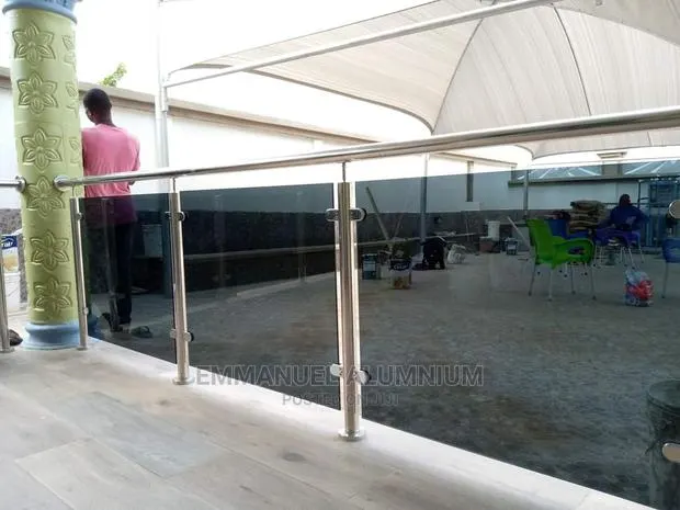 Modern Stainless for Porch With Blue Reflective Glass · Photo 1