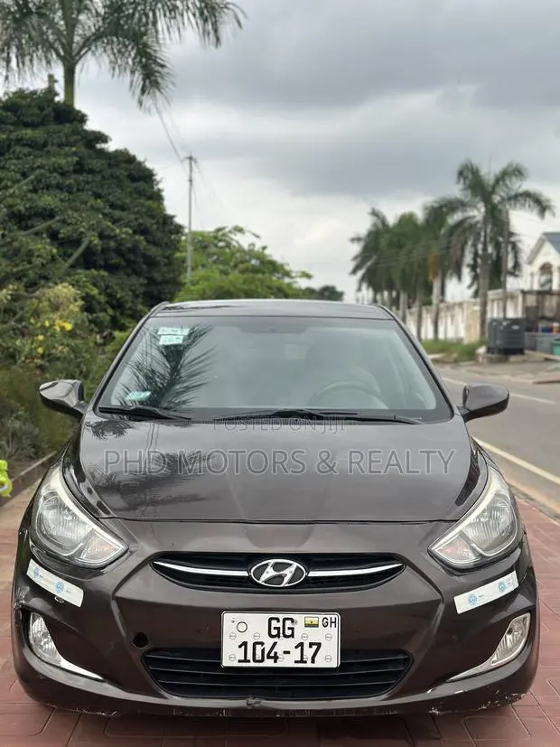 Hyundai Accent GS 4dr Hatchback (1.6L 4cyl 6A) 2015 Brown · Photo 1