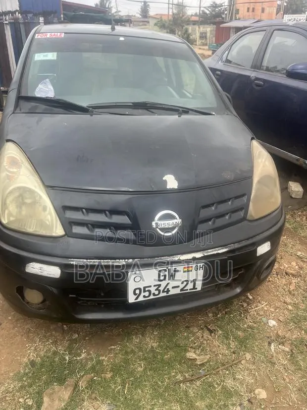 Nissan Pixo 1.0 FWD 2010 Black · Photo 1