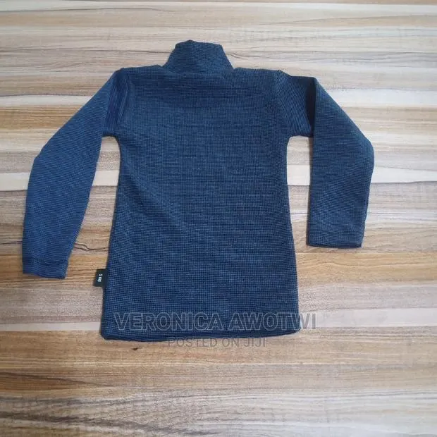 Kid's Tortoise Neck Shirt · Photo 1