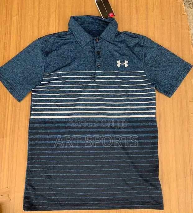 Under Amour Polo Top · Photo 1