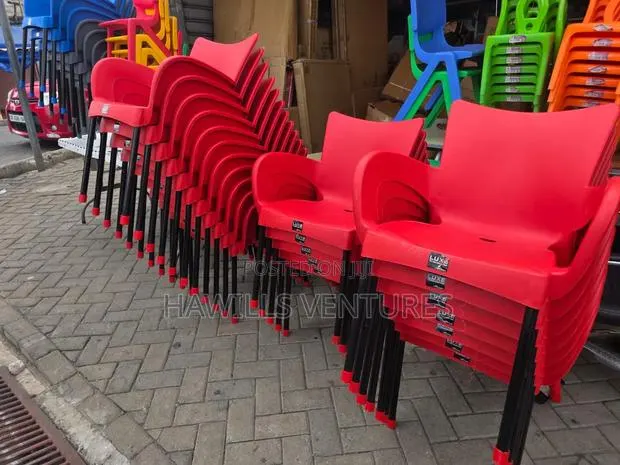Red Colour Luxe Plastic Chair Feature Black Metal Legs. · Photo 1