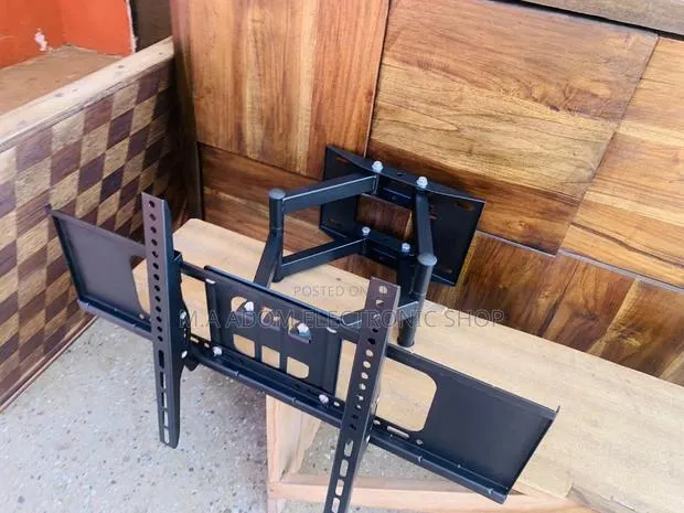 Full Motion TV Wall Mount for Most 32-75” /LED/ TV. · Photo 1