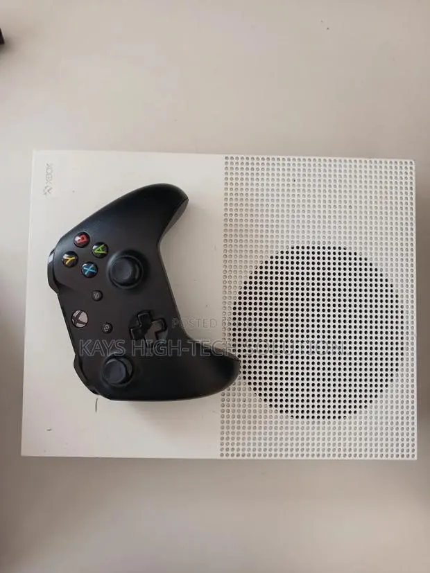 Xbox One S With 1 Controller and Games (FC 27,GTA v ETC) · Photo 1