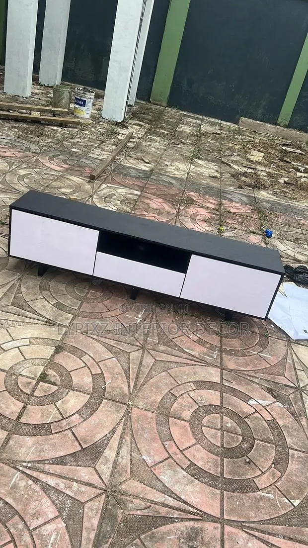 3 Storage TV Stand · Photo 1