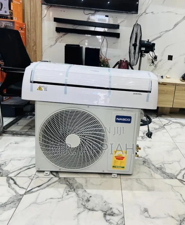 Low Energy Consumption Nasco 2.5hp Air Conditioner(White)Remote · Photo 1